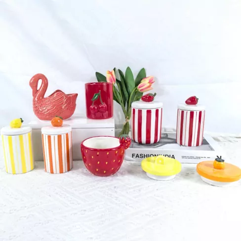 Giá đỡ nến gốm hình hoa và trái cây